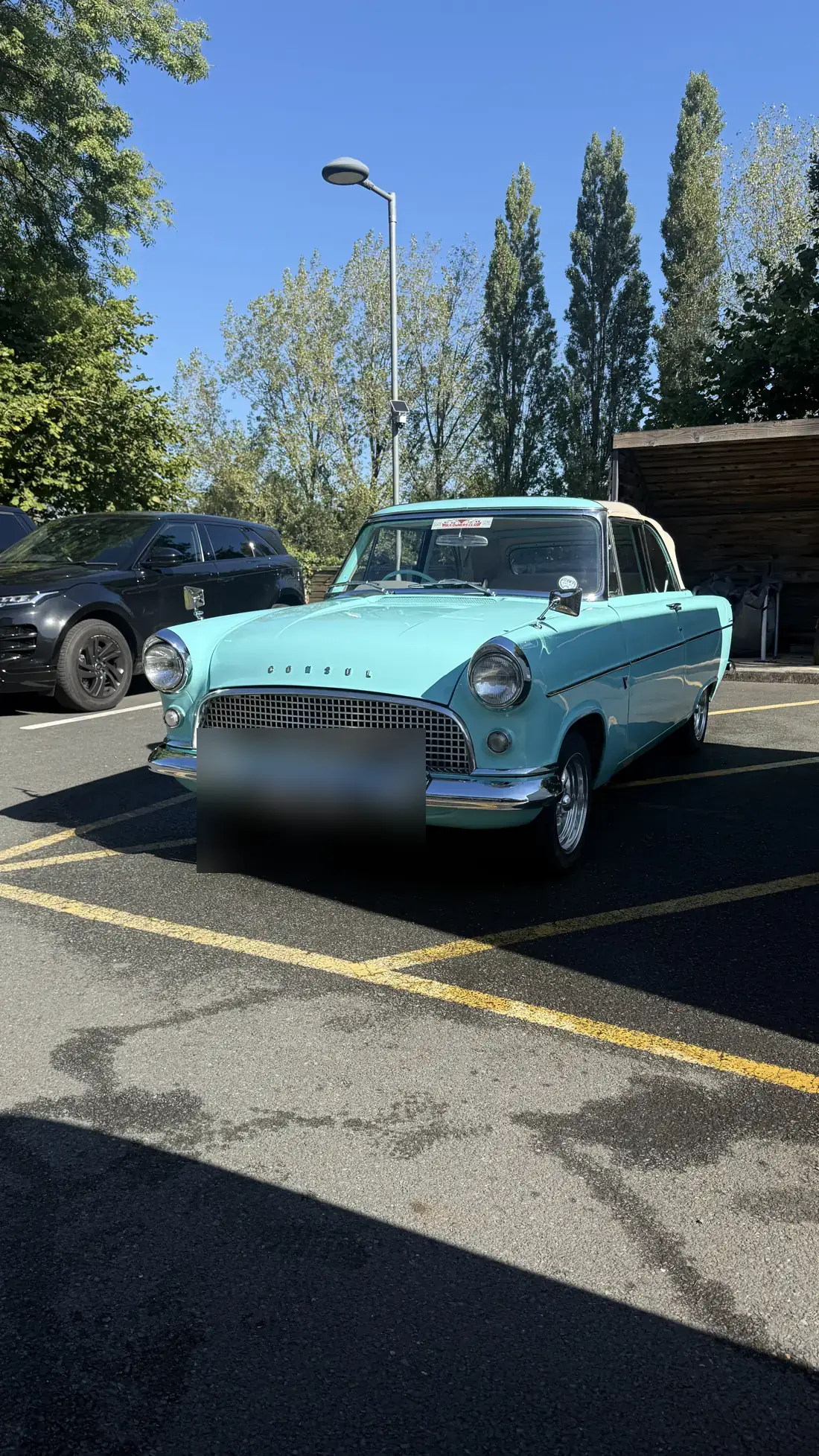 Classic saloon in pale blue after a full detail